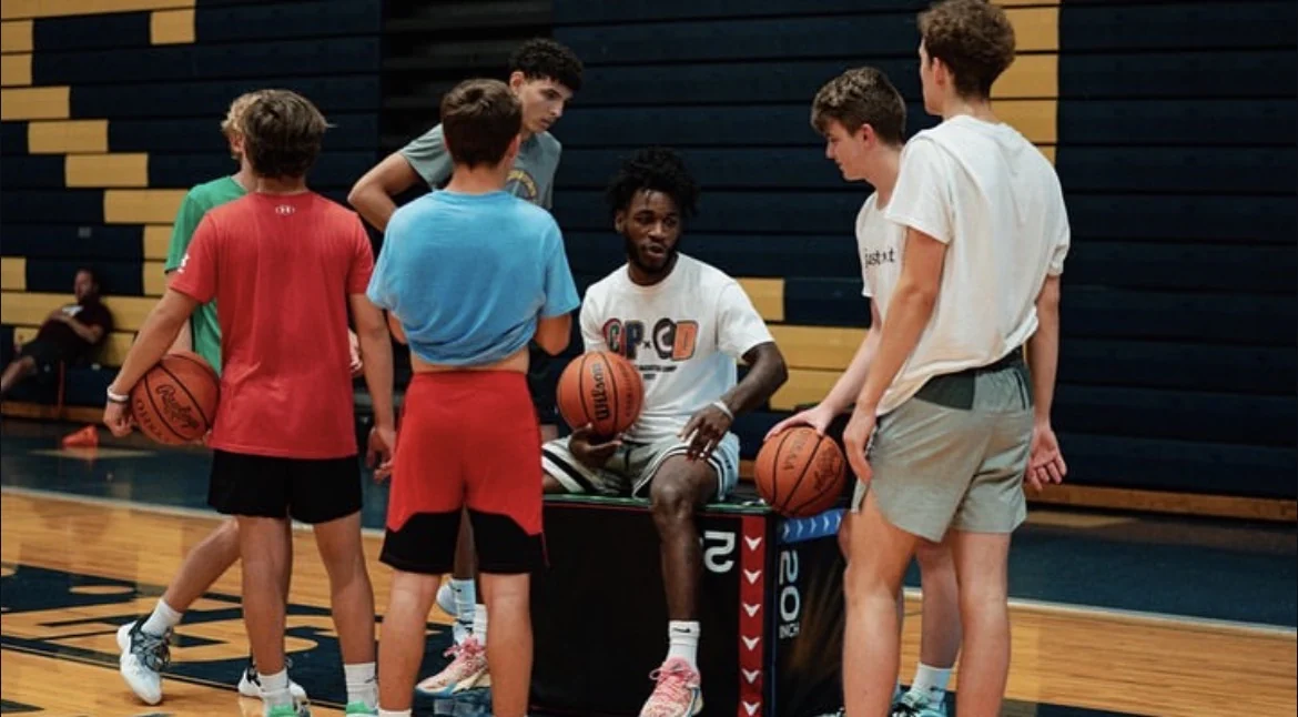 Coach Alontay teaching a group